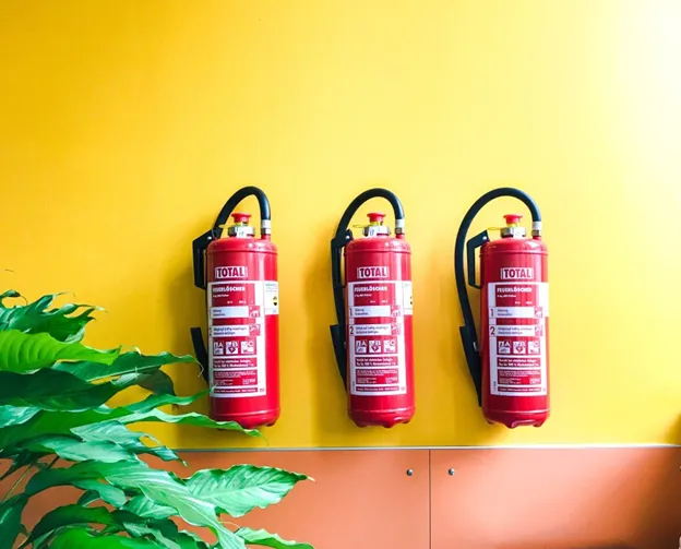 Extinguishers on wall